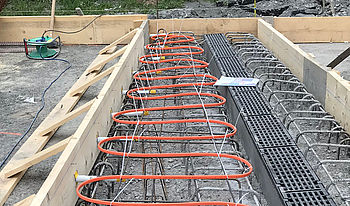 Heizbänder für Freiflächen aus Beton: Systec Therm AG
